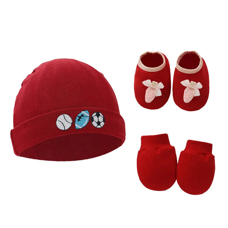 Set of white, light blue, and grey cotton baby pullover caps, gloves, and foot covers for infants.