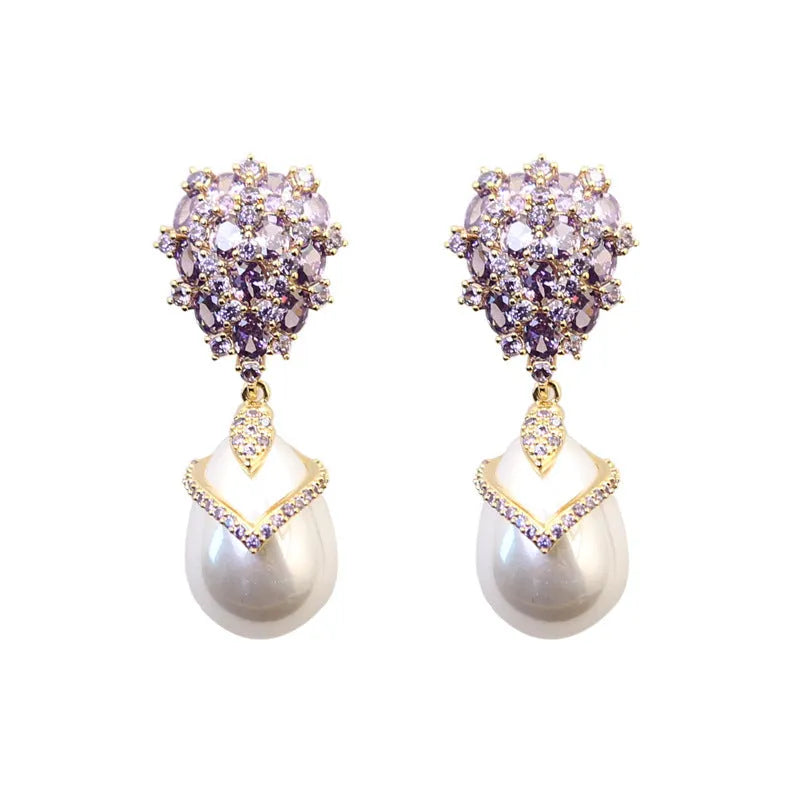 Women's drop shape pearl earrings with zircon accents on 18K gold plated copper setting