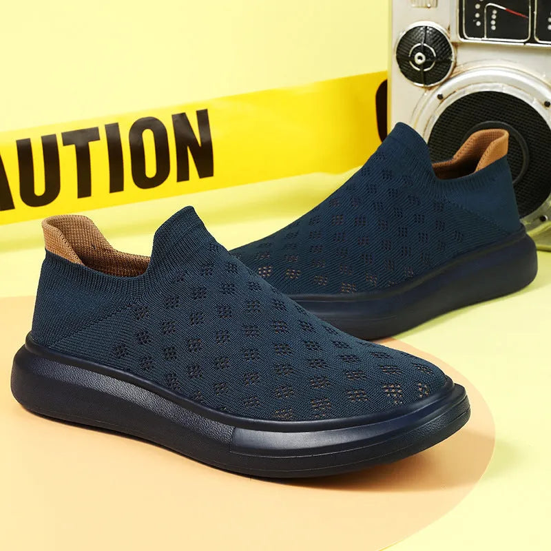 Men's mesh casual breathable solid colour sneakers shown in black colourway