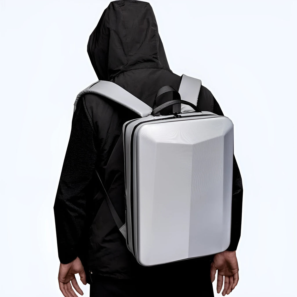 A black men's business backpack made of ABS PC and Oxford cloth, shown with curved shoulder straps.