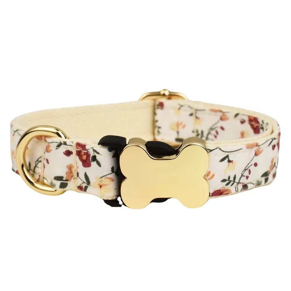 Nylon dog collar with a printed grid pattern and a large bone-shaped metal buckle.