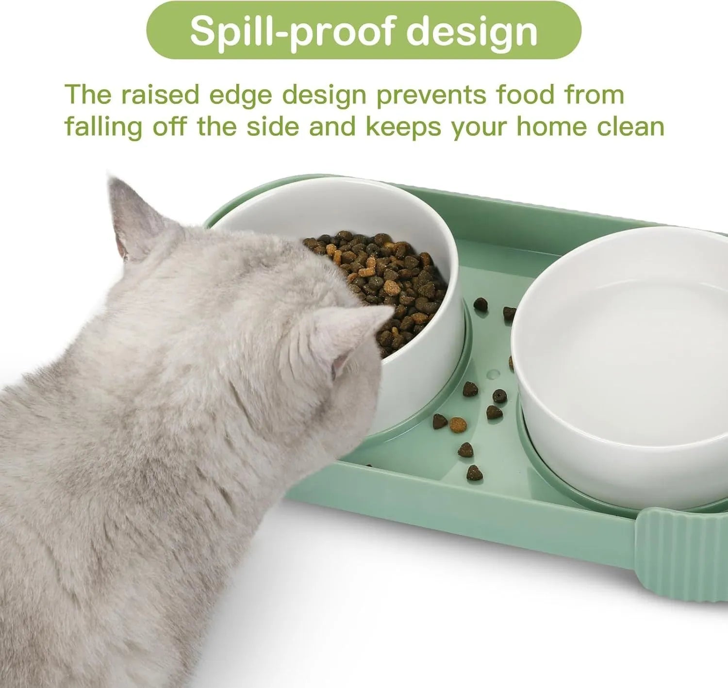 Green ceramic elevated cat feeder with two tilted bowls on a non-slip stand