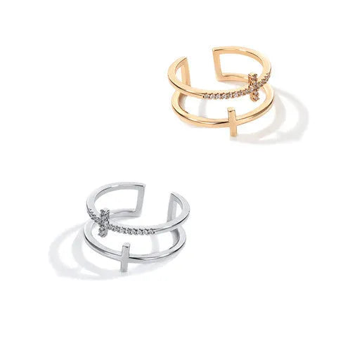 Double cross geometric women's ring with zircon stones on an adjustable copper band.