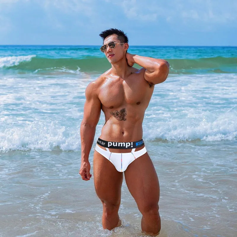 Men's solid-colour modal briefs on a white background, showing low-waist design in black and white.