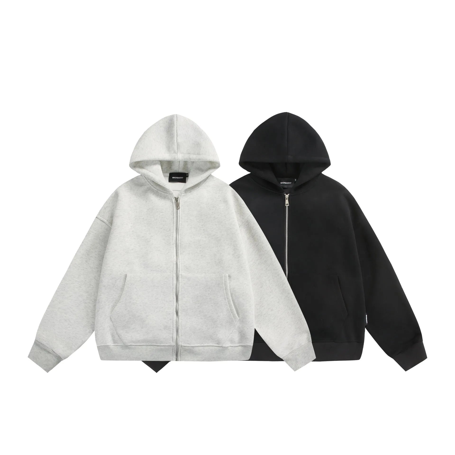 Solid colour loose fit cardigan coat with a back bag detail, shown in black.