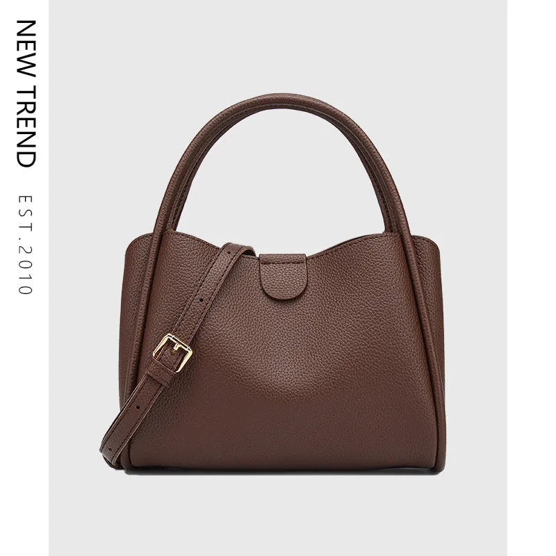 PU leather horizontal square messenger bag 24x11x18cm in brown with single shoulder strap and stitch detailing
