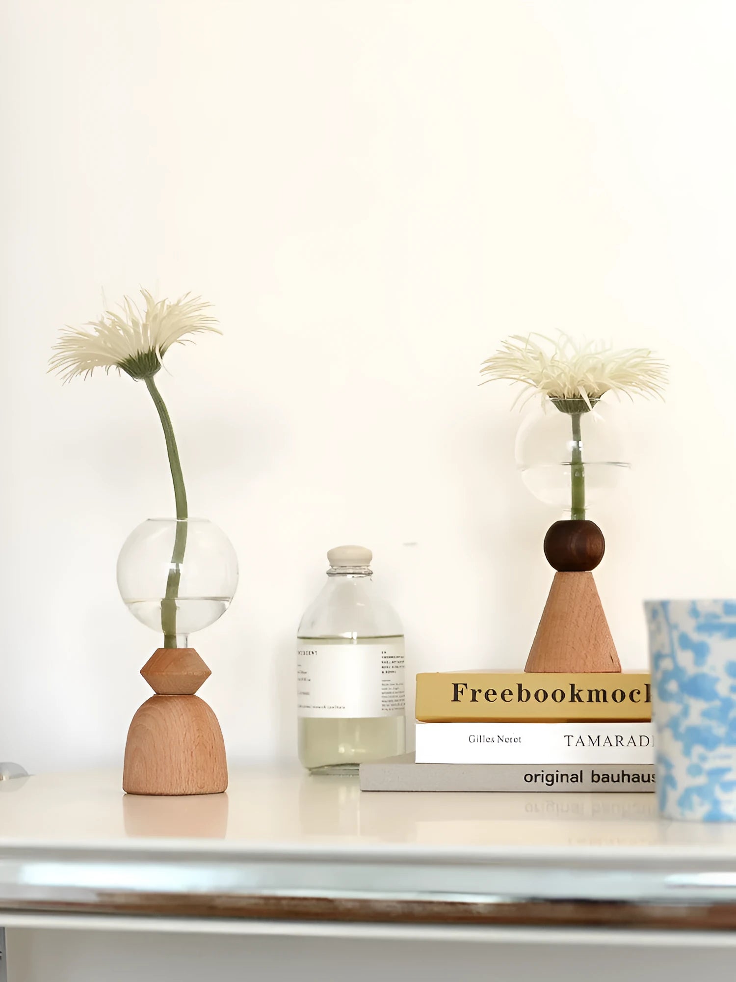 Nordic geometric bubble glass vase with wooden base showing conical and arc bottom designs