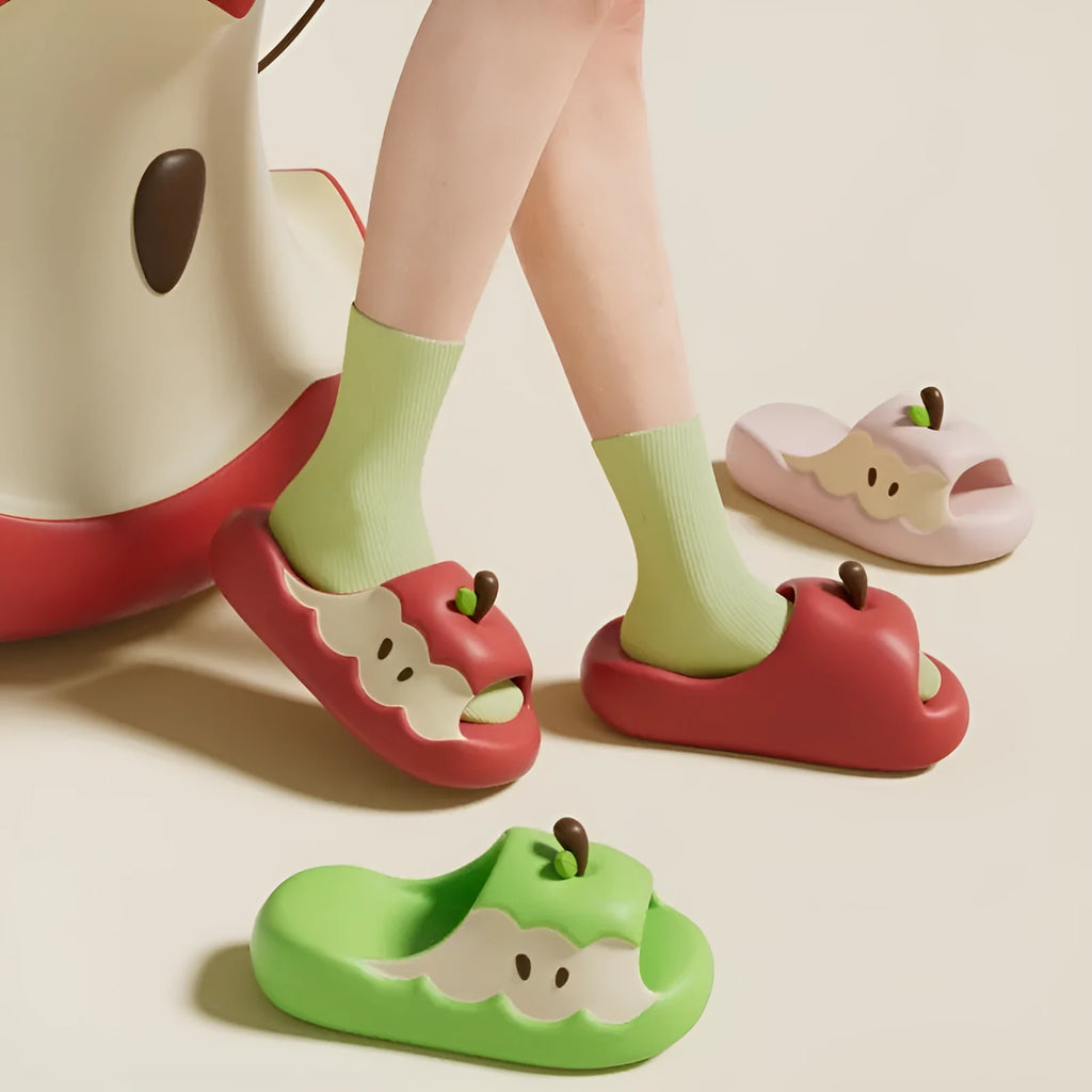 Cartoon-themed EVA flip flop sandals with fruit designs in light blue, suitable for couple and family wear.