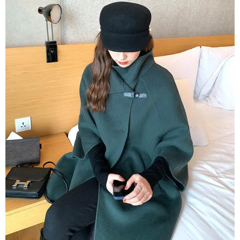 Women's oatmeal coloured acrylic coat with flight sleeves and a long 100cm length.