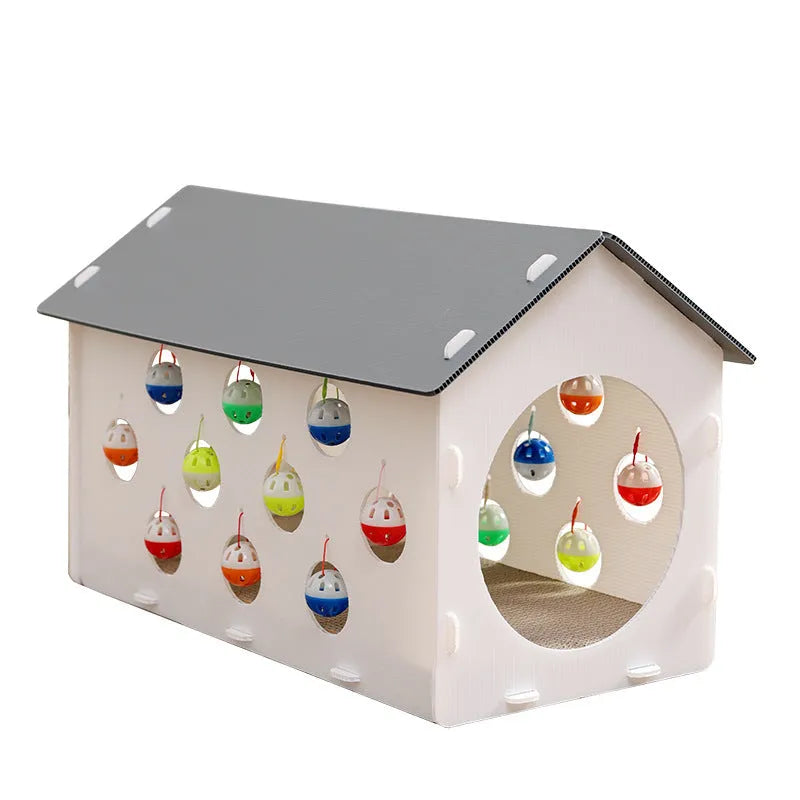 White plastic cat scratch board with integrated round nest bed and short tunnel with dangling bell ball