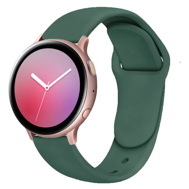 Samsung Galaxy Active 2 watch with a purple reverse buckle silicone strap on a wrist.