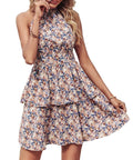 Women's apricot red halter neck summer dress with backless design and ruffled A-line skirt.