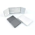 Tri-fold Bluetooth keyboard in black colour showing folded and unfolded positions