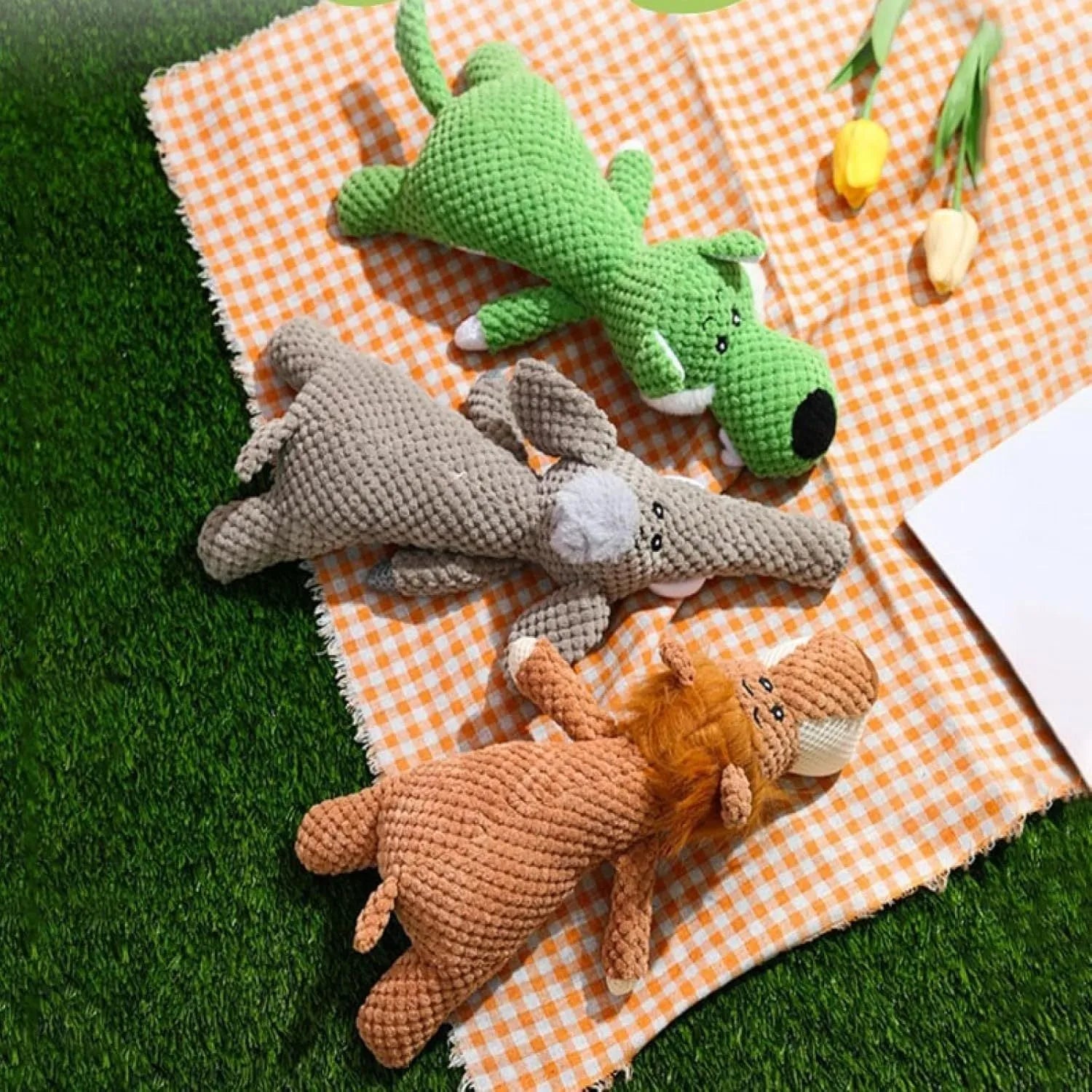 Corn kernel shaped dog plush toy for teeth grinding with interactive sound feature in grey colour