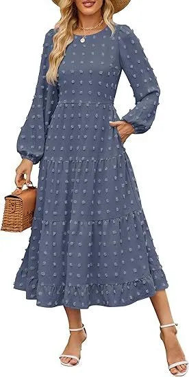 A beige high-waisted long sleeve dress with ruffled sleeves on a hanger.