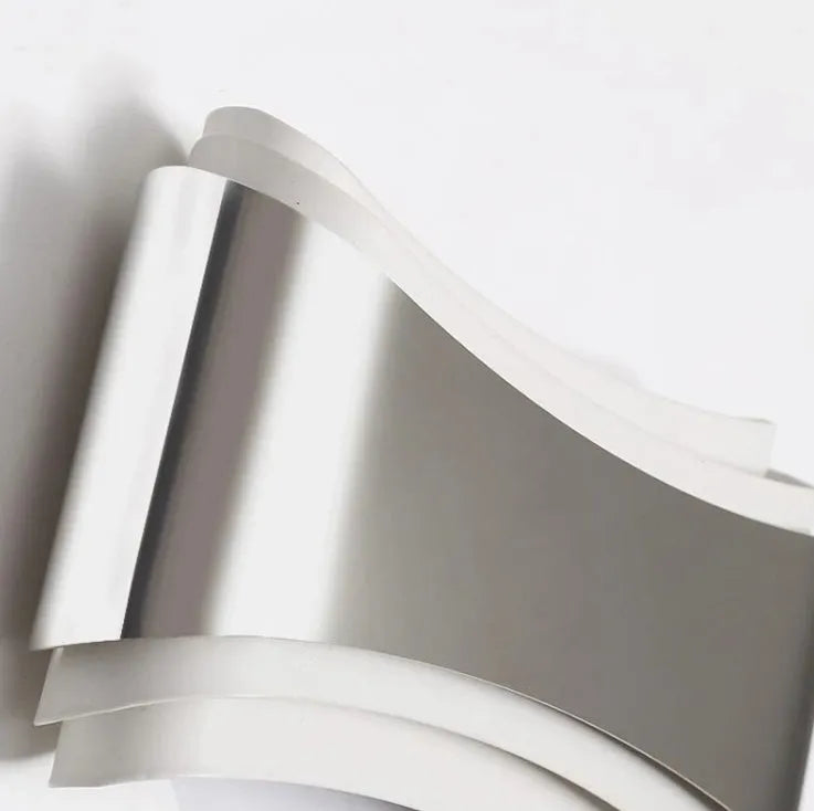 Modern LED wall lamp with warm white light, 23cm wide by 13cm high with matte finish