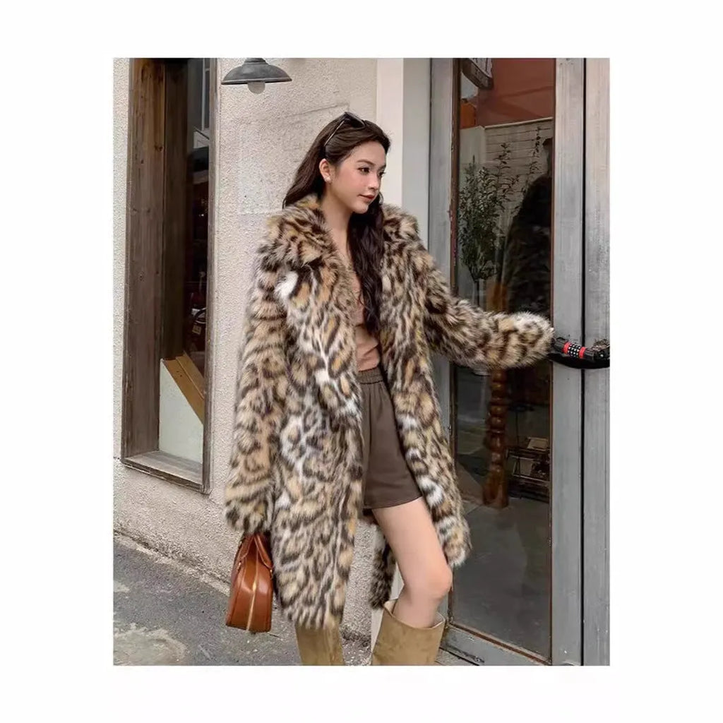 A model wearing a long faux fur coat with a fur collar and pockets.