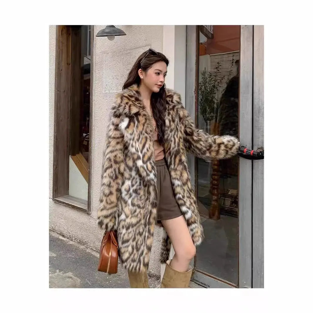 A model wearing a long faux fur coat with a fur collar and pockets.