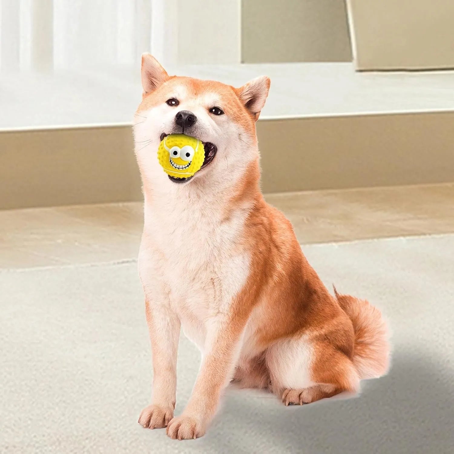 Green latex dog ball with smile face design and squeaker for pet play