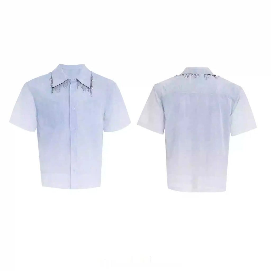 Blue and white gradient short-sleeved loose-fit shirt on a hanger.