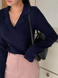 Women's v-neck hemmed pullover sweater with vertical sunken stripe in light gray, slim fit, long sleeve