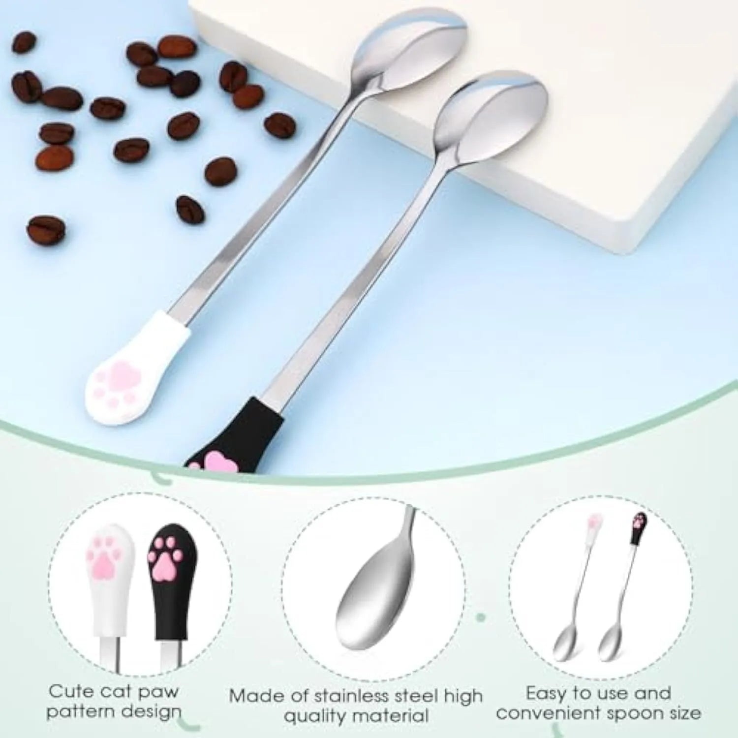 White and black pet food spoons with stainless steel heads and silicone handles showing cat paw design