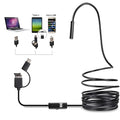 USB-C endoscope with waterproof camera, flexible black cable, and separate hook, magnet, and side mirror attachments on a table.