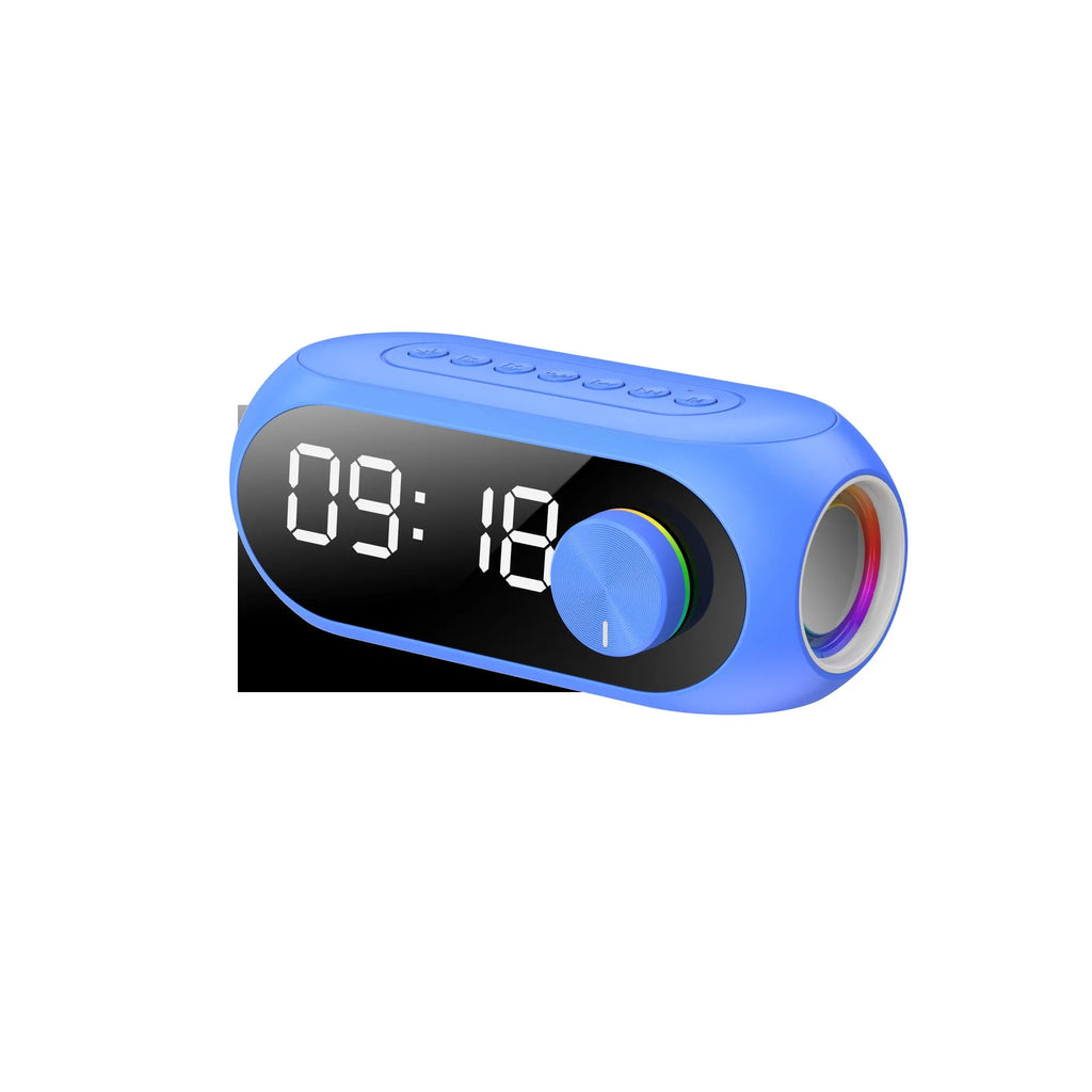 S8 Black Extra Bass portable mini USB speaker on a desk next to a laptop.
