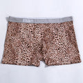 Men's loose fit leopard print underwear in milk silk polyester fabric showing mid-waist design