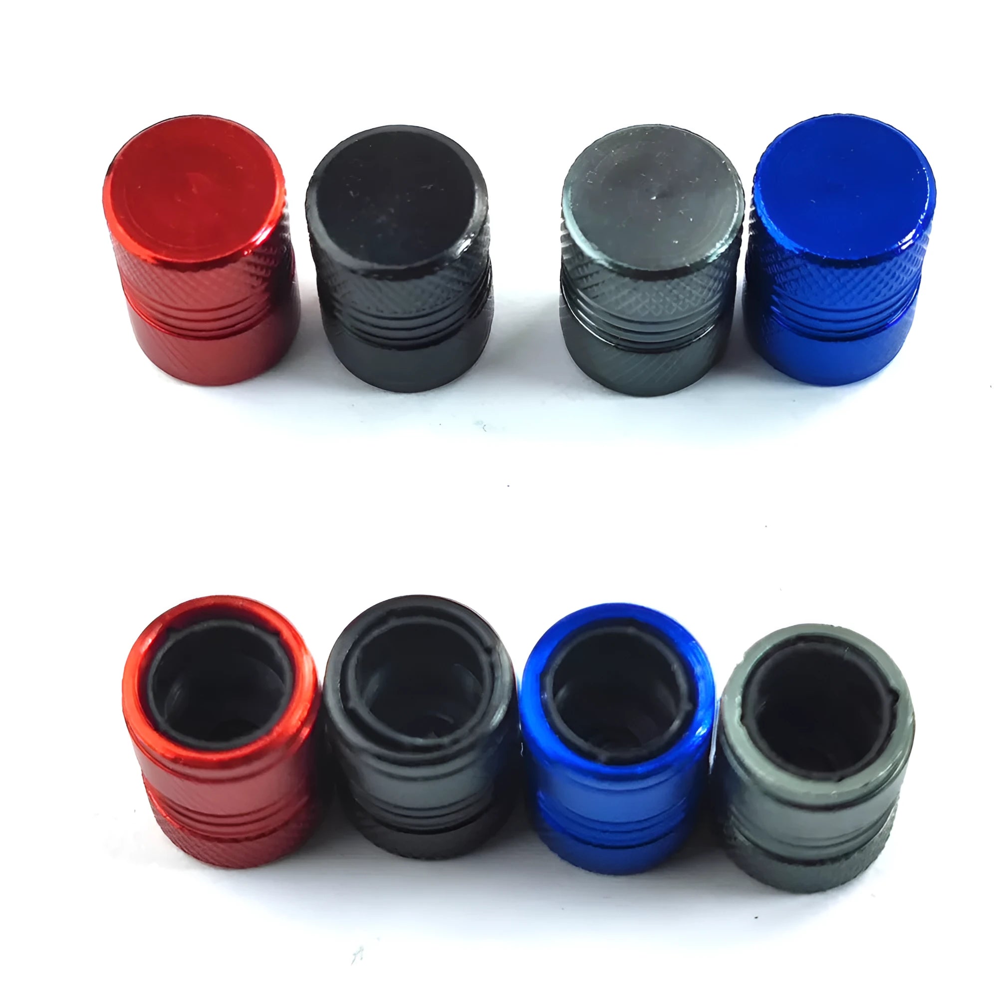 Aluminium car tyre valve dust cap in four colour options: black, blue, grey, and red.