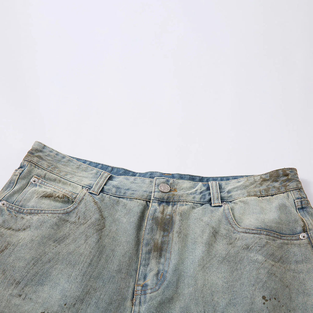 Washed blue cropped denim jeans with straight-leg cut and zip fly front