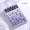 Desktop calculator with gradient colour finish in violet, cherry blossom pink, glacier blue, or mint green on a desk.