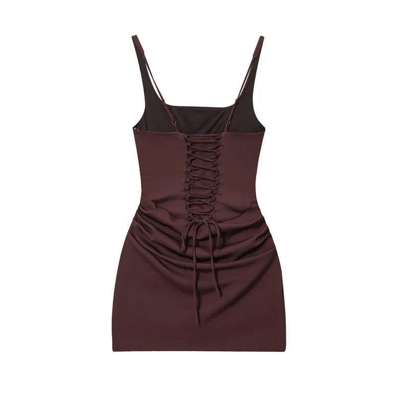 Mercerised cotton hooded sleeveless sheath dress in brown with stripe and plaid pattern and pleated asymmetric hem front view