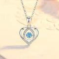 Blue diamond heart necklace and bracelet set with adjustable chain on copper background