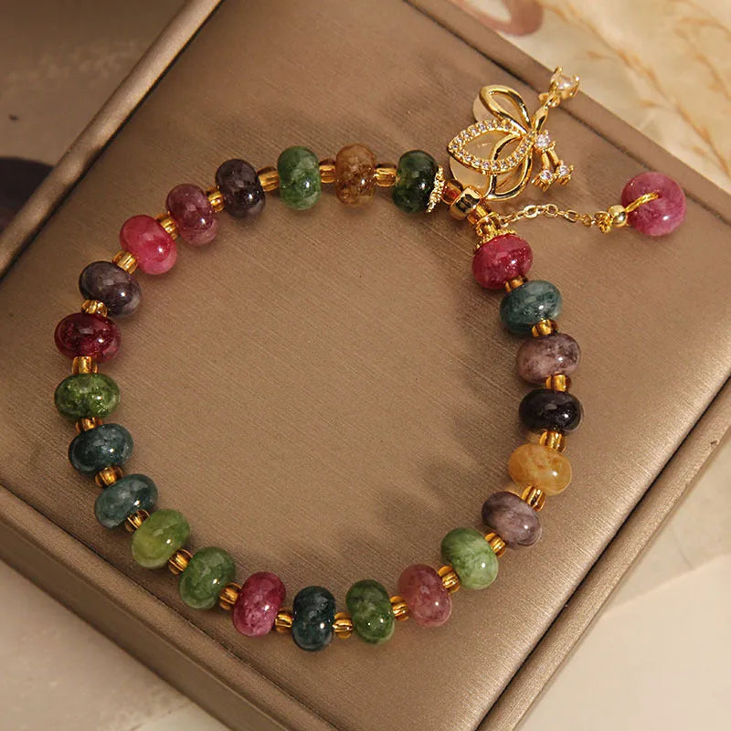 Women's colourful butterfly bracelet with alloy construction and bead decoration