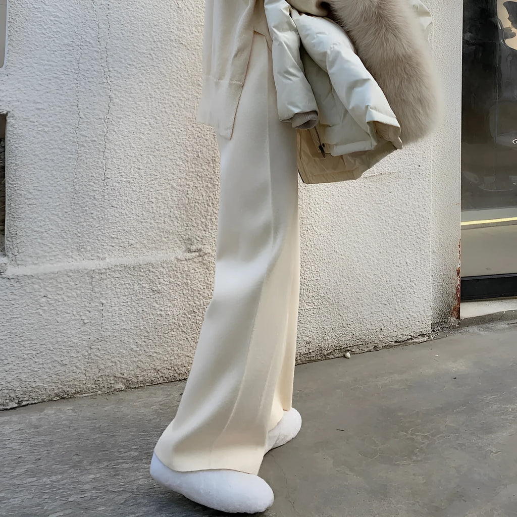 Women's high-waist knitted wide-leg trousers in cream white, floor-length design for winter wear