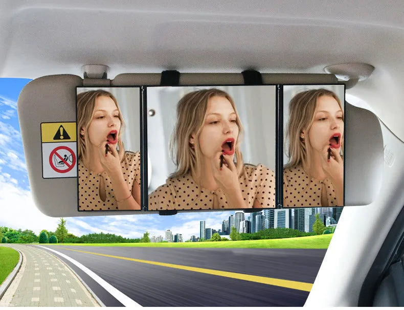 Silver folding makeup mirror shown both closed and opened, next to a car sun visor.
