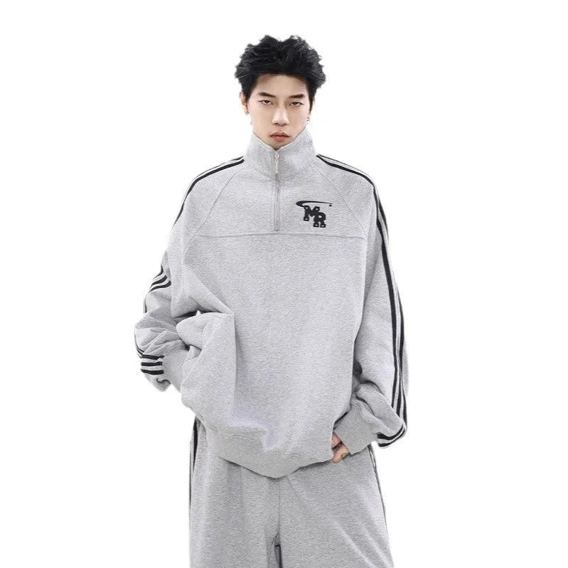 Black American retro style polyester couple's sports hoodie with stand collar and long sleeves.