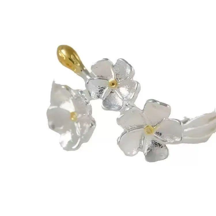 Zinc alloy 3D jasmine flower ring with open mouth design in a choice of patterns and colours.
