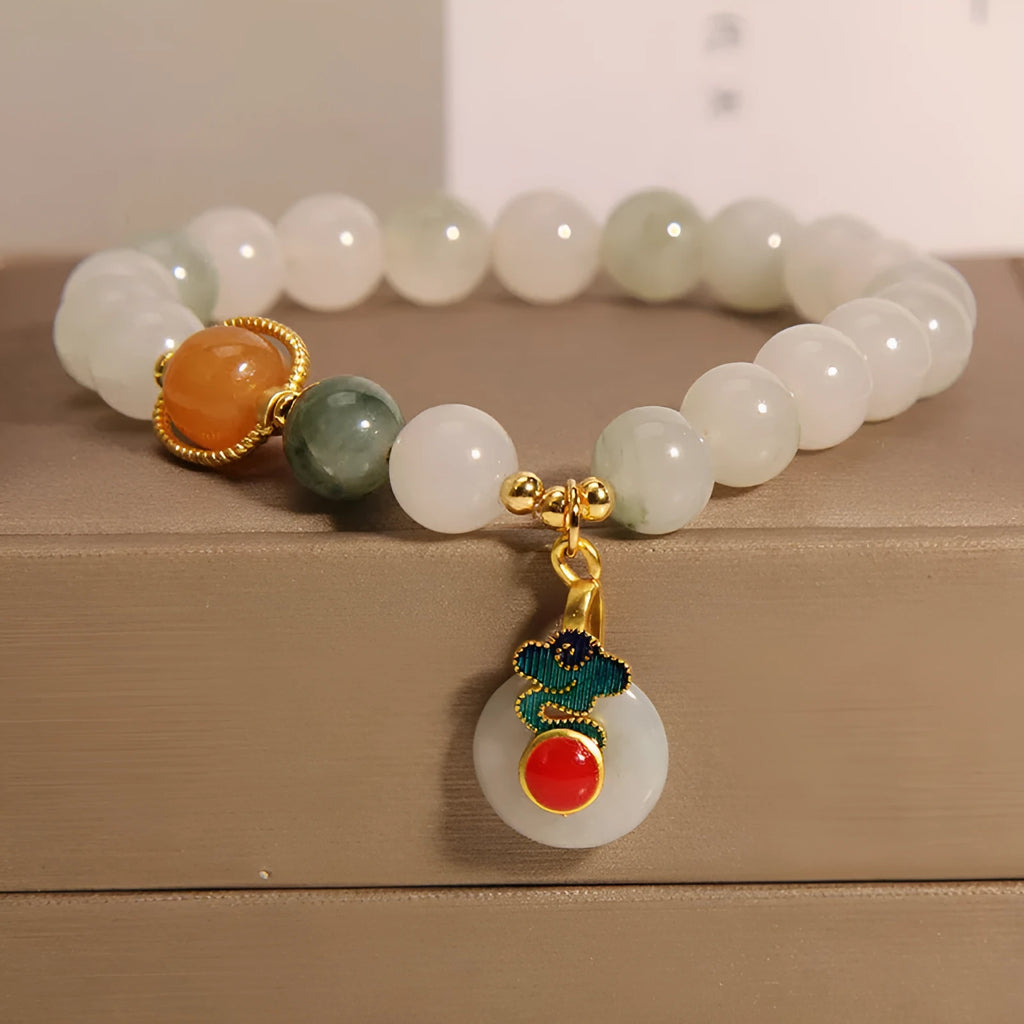 Women's jade crystal bracelet with ice jade colour, xiangyun patterns and pearl decorative elements