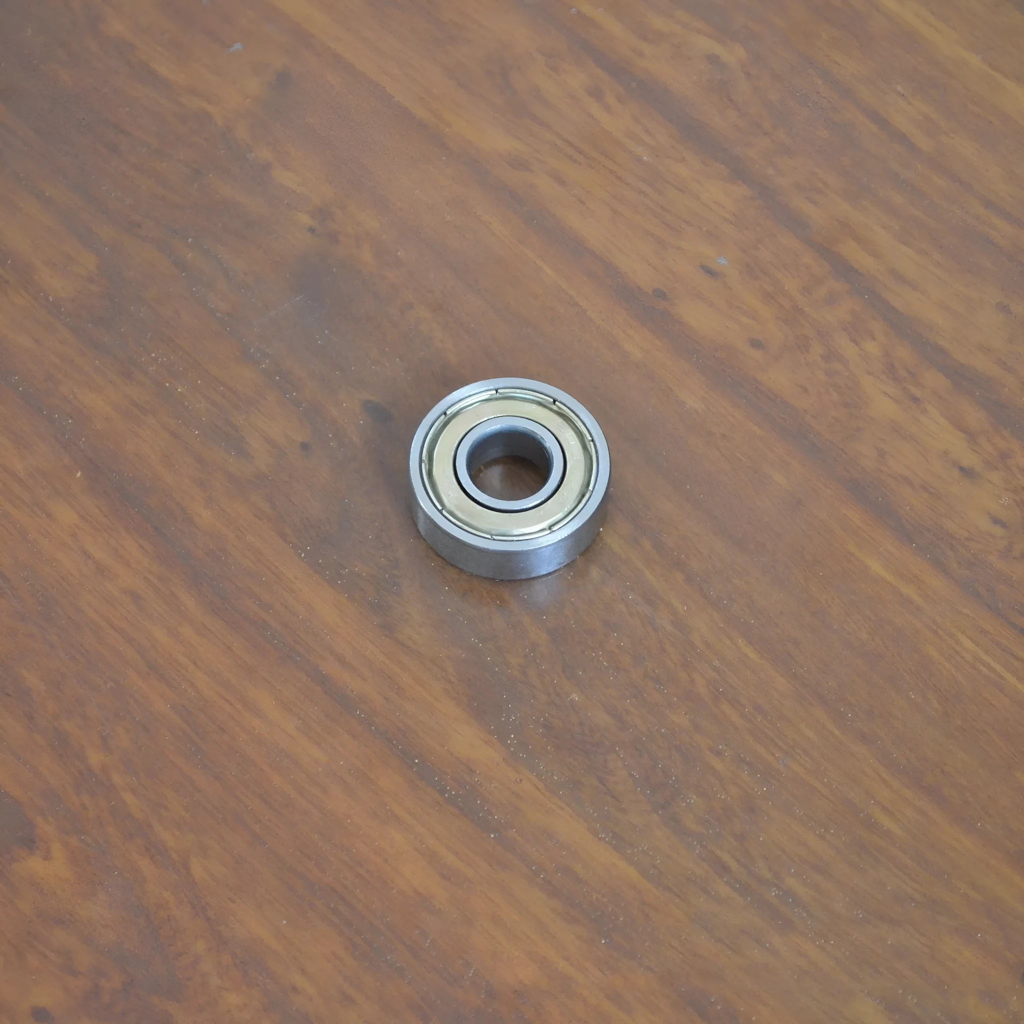 6000zz carbon steel deep groove ball bearing with 10mm inner diameter, 26mm outer diameter, and 8mm width.