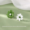 Flower-shaped alloy stud earrings in white and green, yellow and white, blue and orange colour combinations