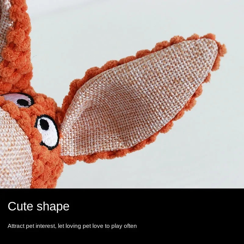 Plush squeaky dog toy in animal shape for chewing and teeth cleaning