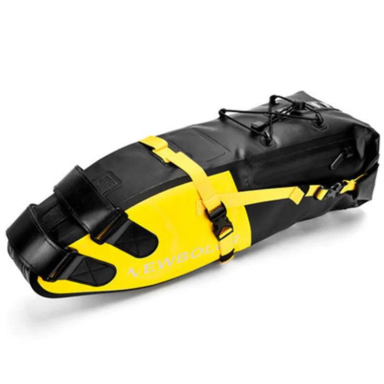 Yellow waterproof PVC bicycle tail bag mounted on a bike rack, showing its 58cm length and large main compartment.