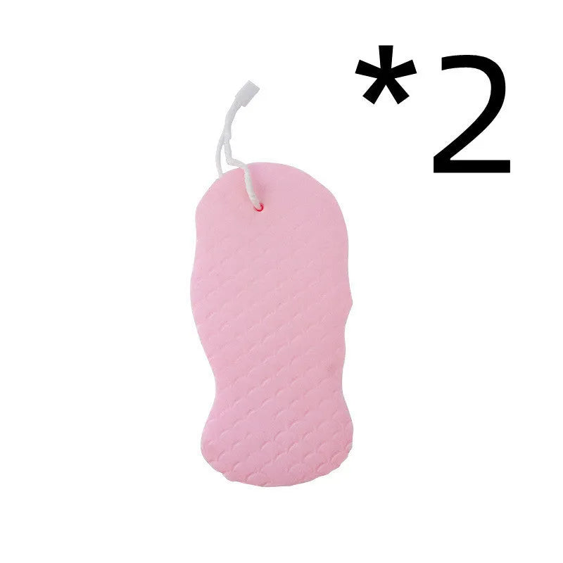 White 3D fish scale pattern bath sponge ball for gentle body exfoliation in the shower.