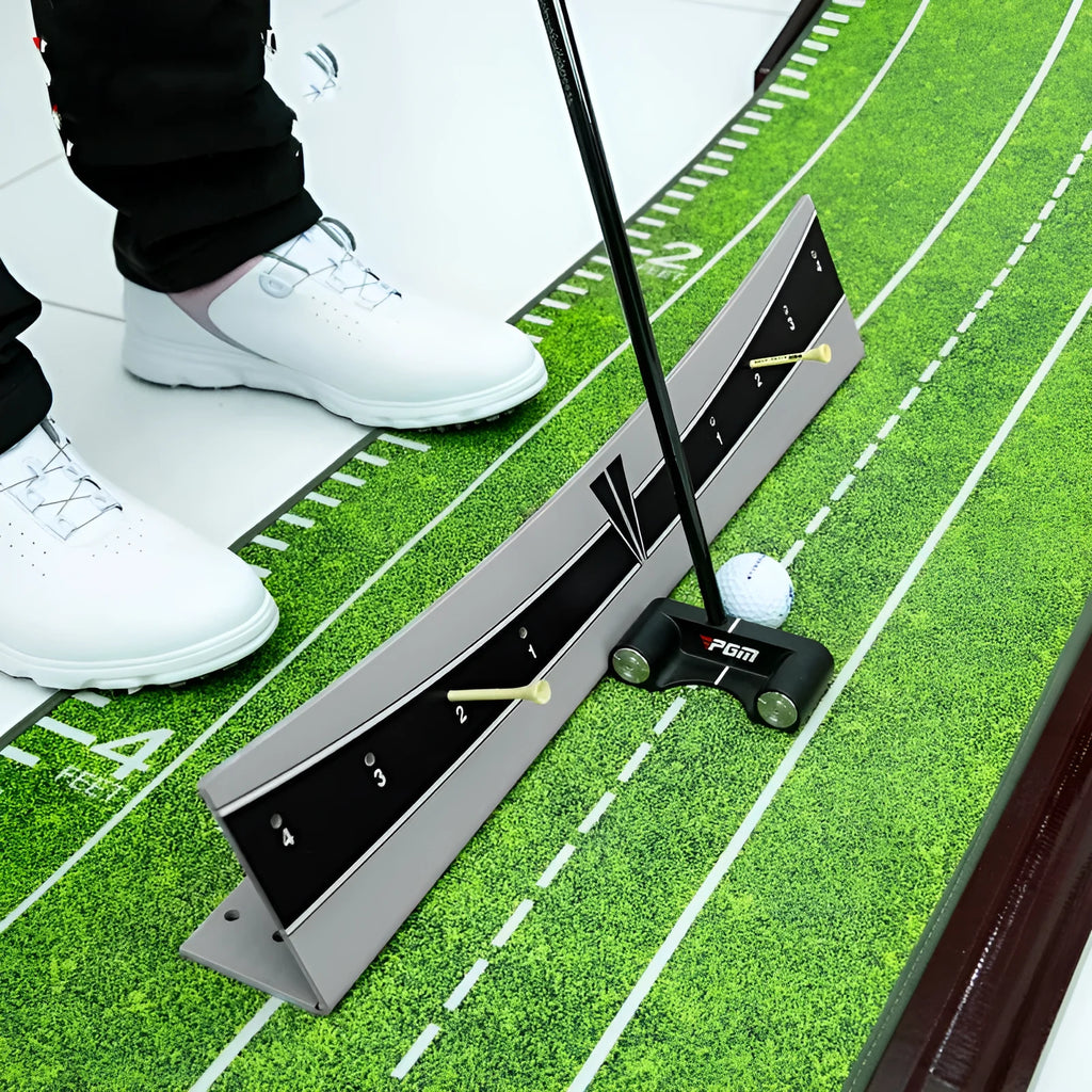 Golf putter resting against the adjustable PVC push rod balancer of the trajectory balance simulator on a carpet.