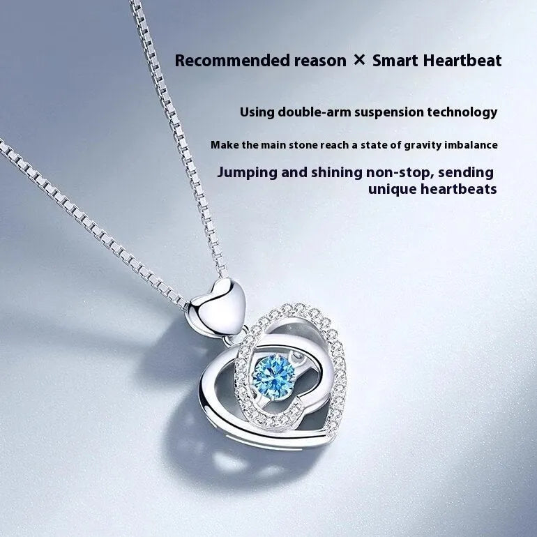 Blue diamond heart necklace and bracelet set with adjustable chain on copper background