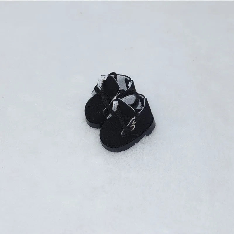 A pair of polyurethane doll shoe accessories for a 17cm figure, shown in a selected style and colour.