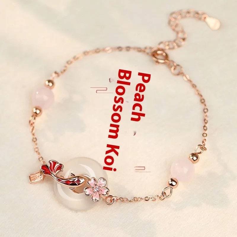 S925 sterling silver bracelet with Chinese flower designs, koi pattern and white chalcedony crystals