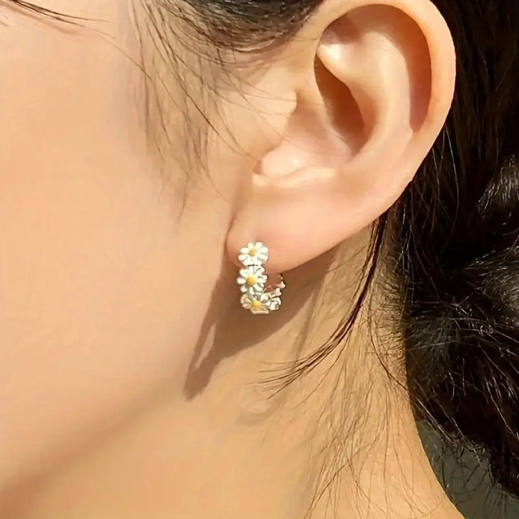 White electroplated daisy flower ring earrings with platinum gem detailing for fashion jewellery wear